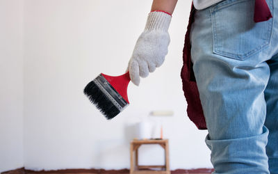 Midsection of man working at home