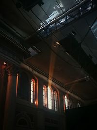 Low angle view of illuminated ceiling