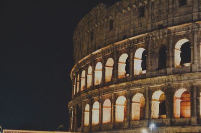 Low angle view of historical building against sky at night