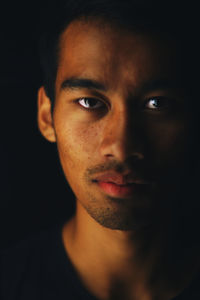 Close-up portrait of young man