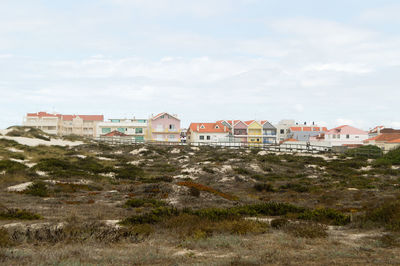 Buildings against sky