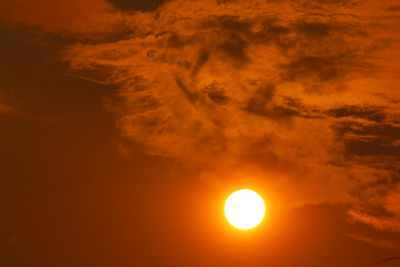 Low angle view of dramatic sky during sunset