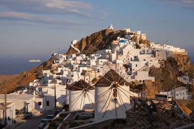 Windmills stand near the entrance to the chora of serifos, greece
