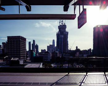 Modern buildings in city against sky