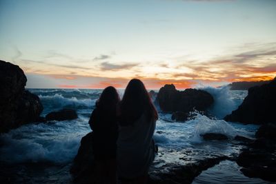 Scenic view of sea at sunset