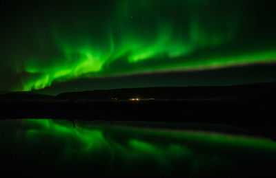 Scenic view of illuminated sky at night