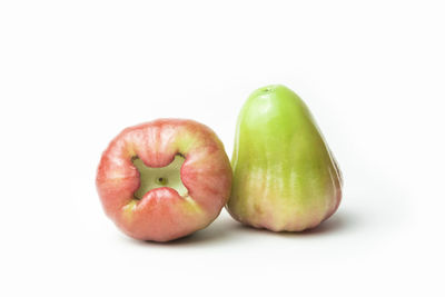 Close-up of apple against white background