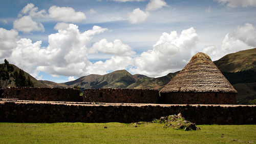 Panoramic view of landscape against cloudy sky