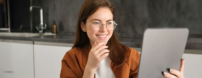 Young woman using mobile phone