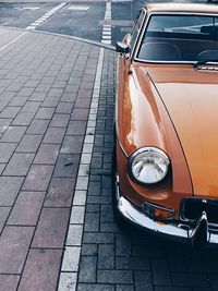 Close-up of classic car on street