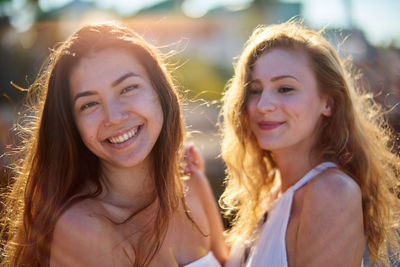 Close-up of smiling female friends