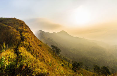 Scenic view of mountains against sky during sunset