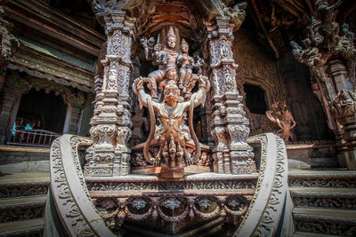 Low angle view of statue of historic building