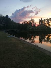 Scenic view of lake against sky during sunset