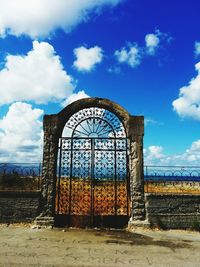 Built structure against cloudy sky