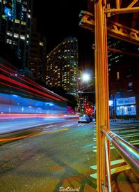 Light trails on city street at night