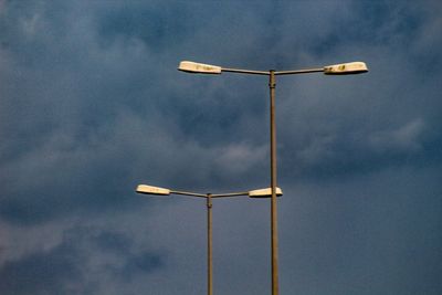 Low angle view of wind turbine against sky