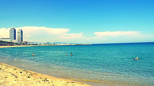 Scenic view of sea against blue sky