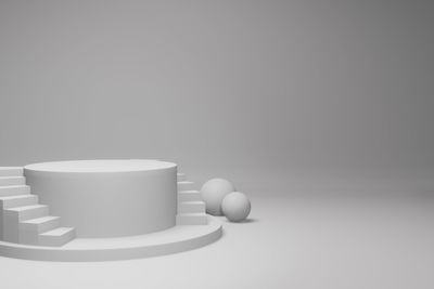 Close-up of coffee cup on table against white background