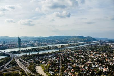 Cityscape with mountain range in background