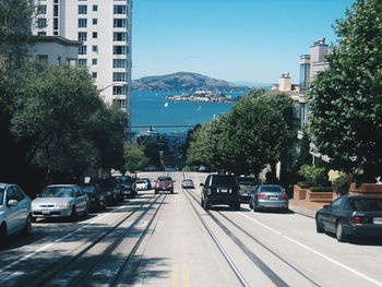 View of road along buildings
