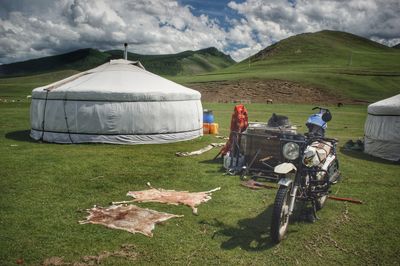 Panoramic view of tent on field against sky