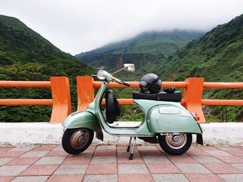 Vintage car against mountains