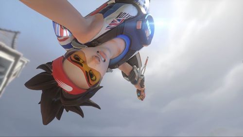 Low angle view of woman flying over sea against sky