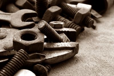 Close-up of rusty metal on table