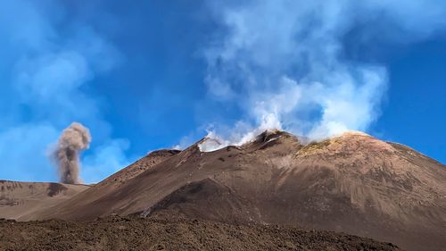 Panoramic view of volcanic landscape against sky