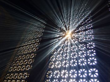 Low angle view of illuminated sky at night