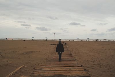 Silhouette of woman at beach