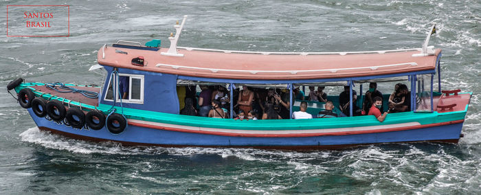 People on boat in sea