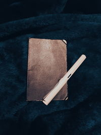 High angle view of cigarette on table