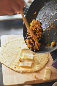 Close-up of person preparing food