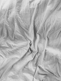 Full frame shot of crumpled on bed