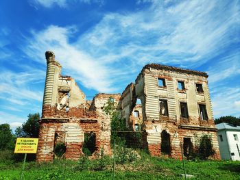 Low angle view of old building against sky
