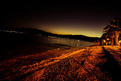Scenic view of sea against sky at night