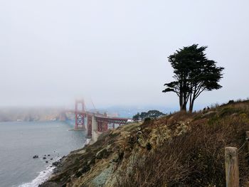 Scenic view of bay against sky