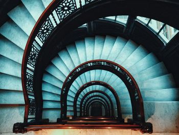 Directly below shot of spiral staircase in building