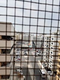 Reflection of buildings on glass window