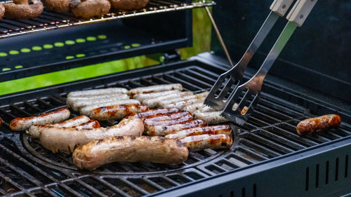 Close-up of meat on barbecue grill