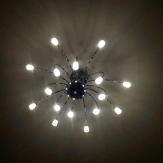 illuminated, ceiling, indoors, lighting equipment, chandelier, hanging, low angle view, decoration, electric light, electricity, electric lamp, glowing, light bulb, decor, light - natural phenomenon, night, hanging light, light, directly below, luxury