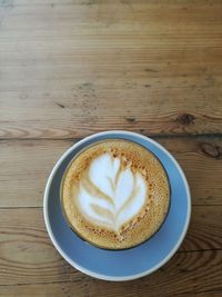 Directly above shot of cappuccino on table