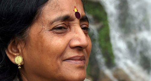 Close-up portrait of woman looking away