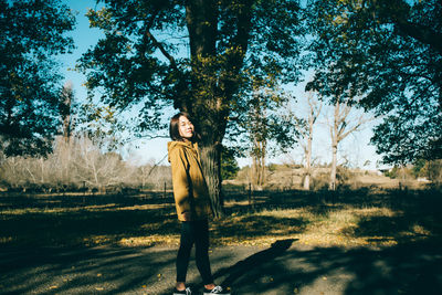 Portrait of man standing on field