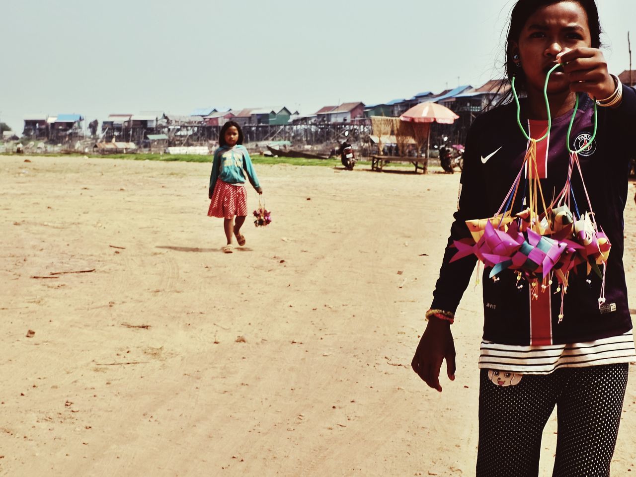 real people, beach, clear sky, outdoors, sand, leisure activity, lifestyles, day, one person, sky, women, nature, young adult, people