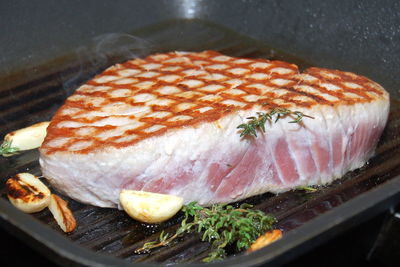 Close-up of tuna on grill