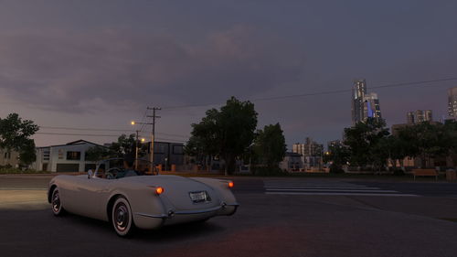 Cars on road at dusk