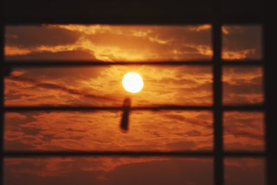 Close-up of silhouette against sky during sunset